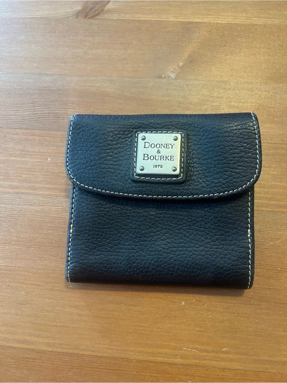 Dooney & Bourke Black Leather Fold Wallet with Logo Plaque